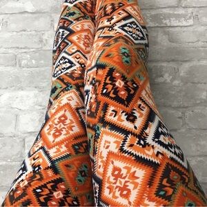 LuLaRoe Orange and Black Patterned Leggings